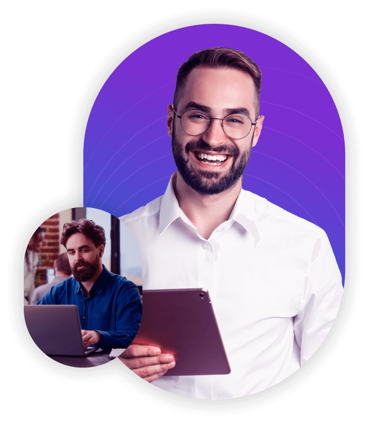 Homem de negócios segurando um Notebook enquanto sorri